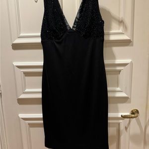 Cache black cocktail dress.